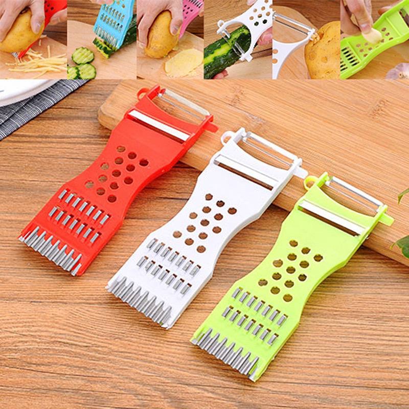 img_5654-2 MULTIFUNCTIONAL KITCHEN VEGGIE & FRUIT SLICER / CHOPPER / CUTTER / PEELER - Image 1