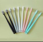 10PCS MACARON SOFT BRISTLES KIDDIES TOOTHBRUSH WITH PROTECTIVE COVERS (AGES 0–3 YEARS) - Image 2