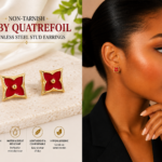 NON-TARNISH RUBY QUATREFOIL STAINLESS STEEL STUD EARRINGS (EAR 015)