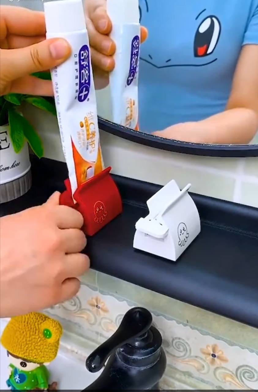 img_6983-2 EASY-SQUEEZE TOOTHPASTE TUBE ROLLER / SQUEEZER - Image 1